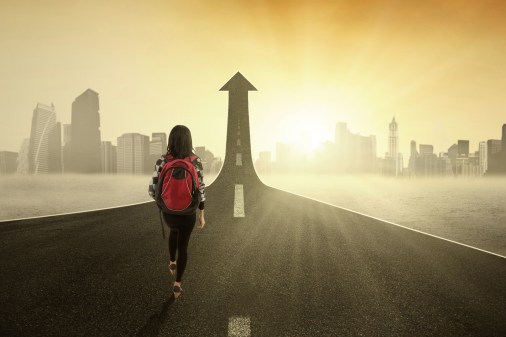 Student walking toward the sky