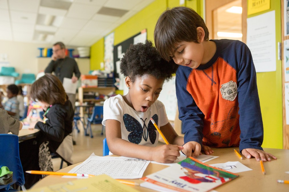 first graders doing math in a classroom