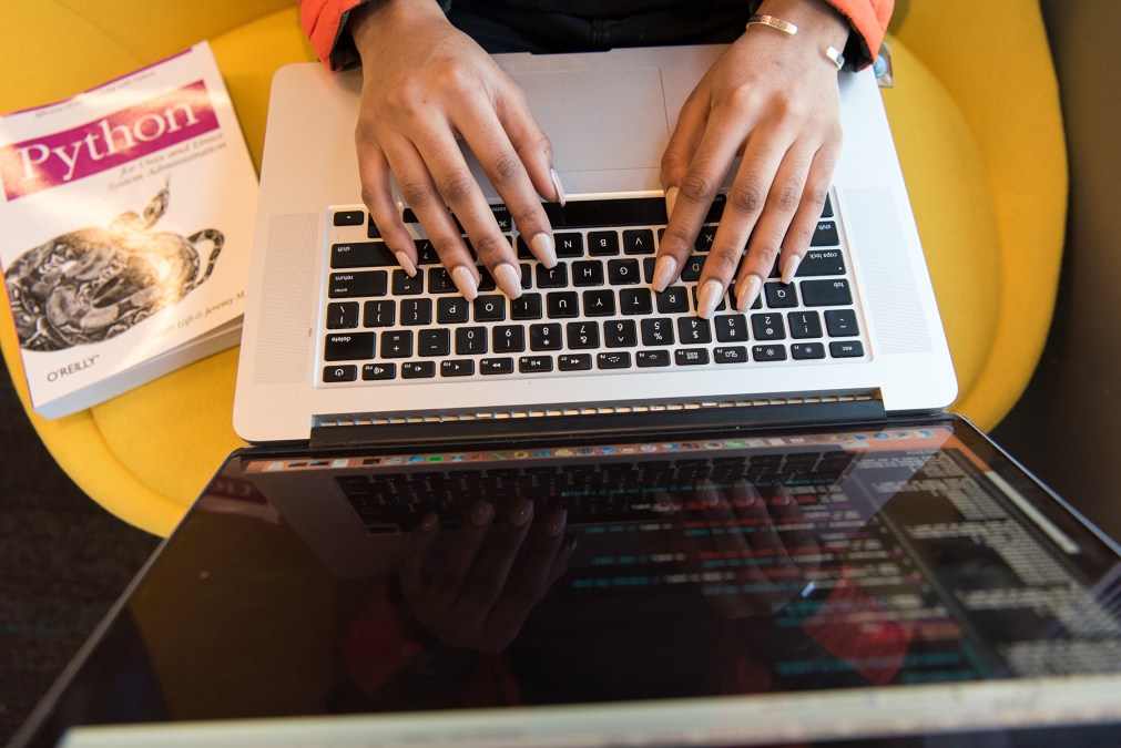 young woman coding