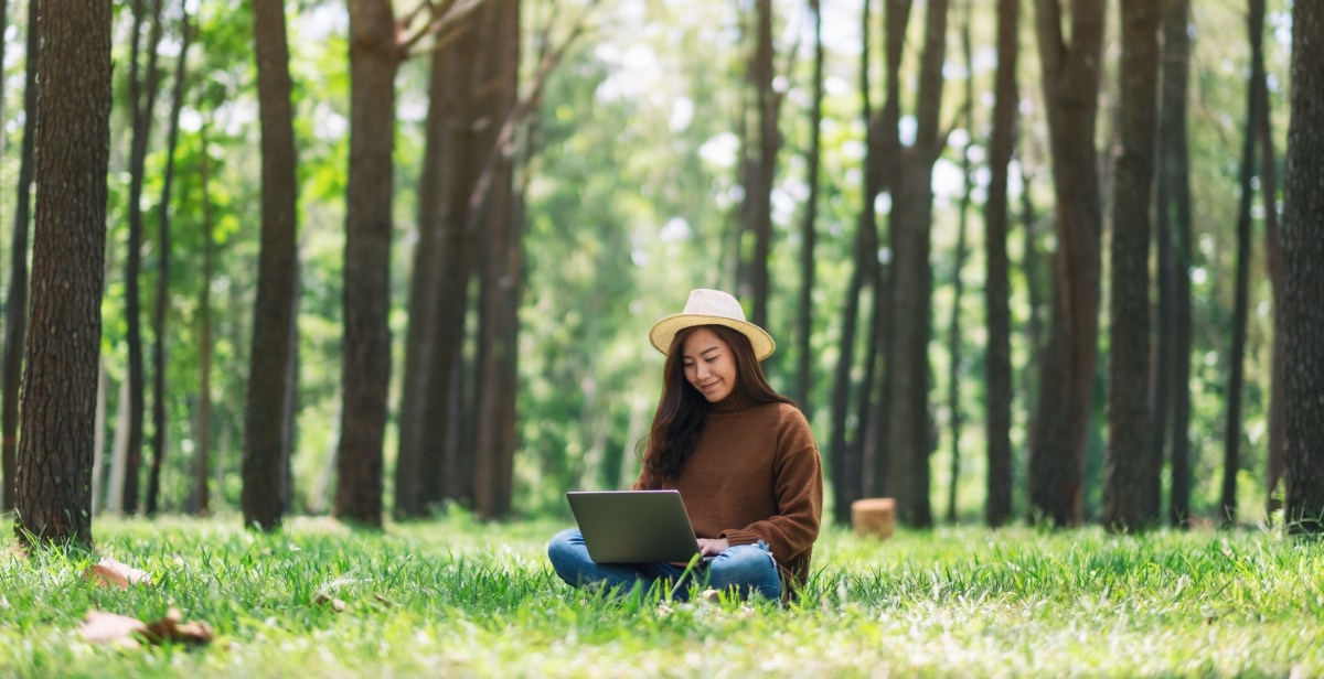 woman on laptop outside