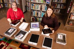 two women sitting in library